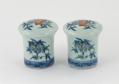 Appraisal: A pair of Chinese doucai scroll terminals painted with fruiting