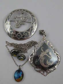 Appraisal: A pair of butterfly wing earrings and pendant together with