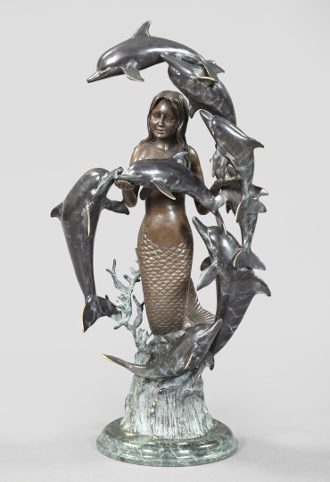 Appraisal: Continental Patinated Bronze Group of a Mermaid with Dolphins in