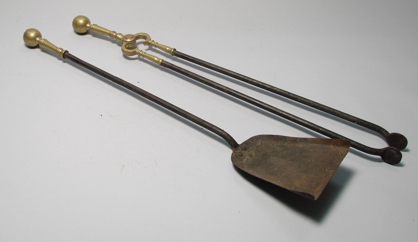 Appraisal: PAIR OF BRASS AND STEEL FIRE TOOLS Boston First Half