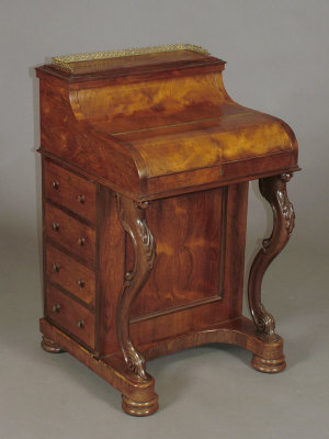 Appraisal: A William IV rosewood Davenport the pierced gilt metal three