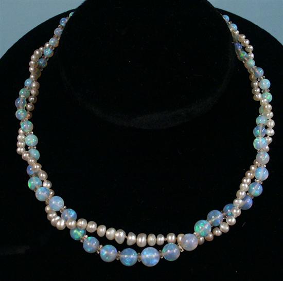 Appraisal: TWO STRAND PEARL AND OPAL GRADUATED BEAD NECKLACE with white