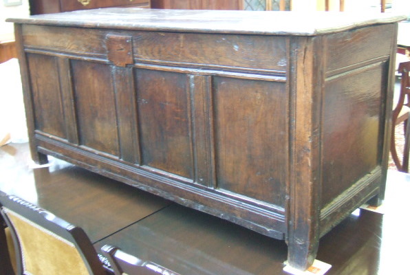 Appraisal: An th century oak coffer the double plank top over