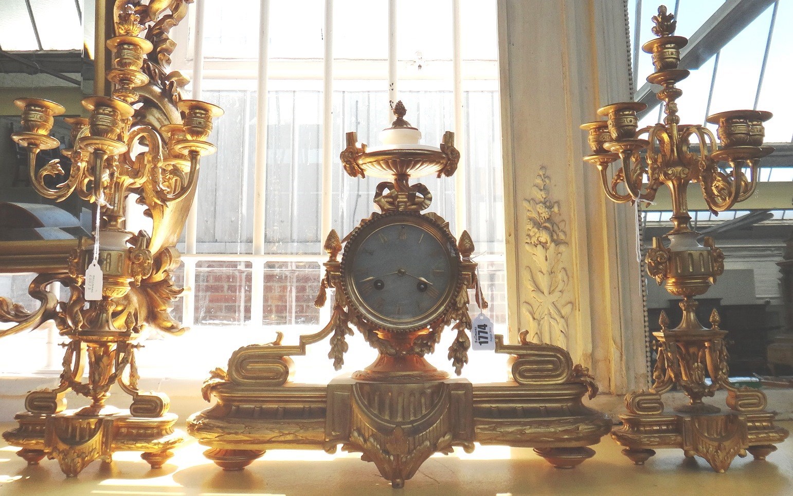 Appraisal: A Louis XVI style ormolu and marble mounted clock garniture