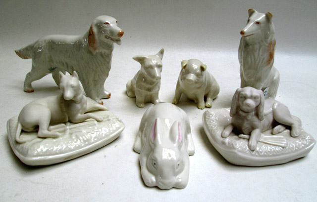 Appraisal: SEVEN BELLEEK ANIMAL FIGURINES consisting of four dogs one pig