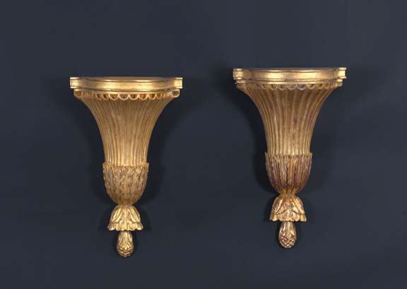 Appraisal: Large Pair of Italian Carved Ribbed and Gilded Tapered Bowfront