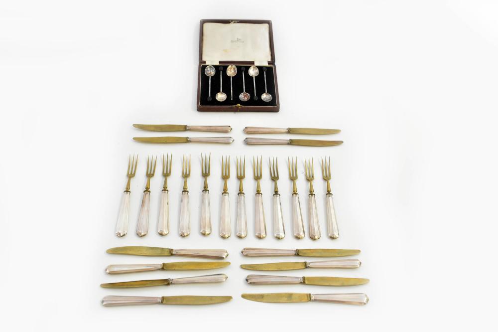 Appraisal: TWENTY-FOUR SILVER HANDLED KNIVES AND FORKSThe knives and forks marked