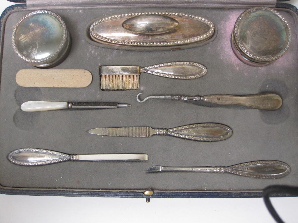 Appraisal: A George VI silver mounted Manicure Set Birmingham in case