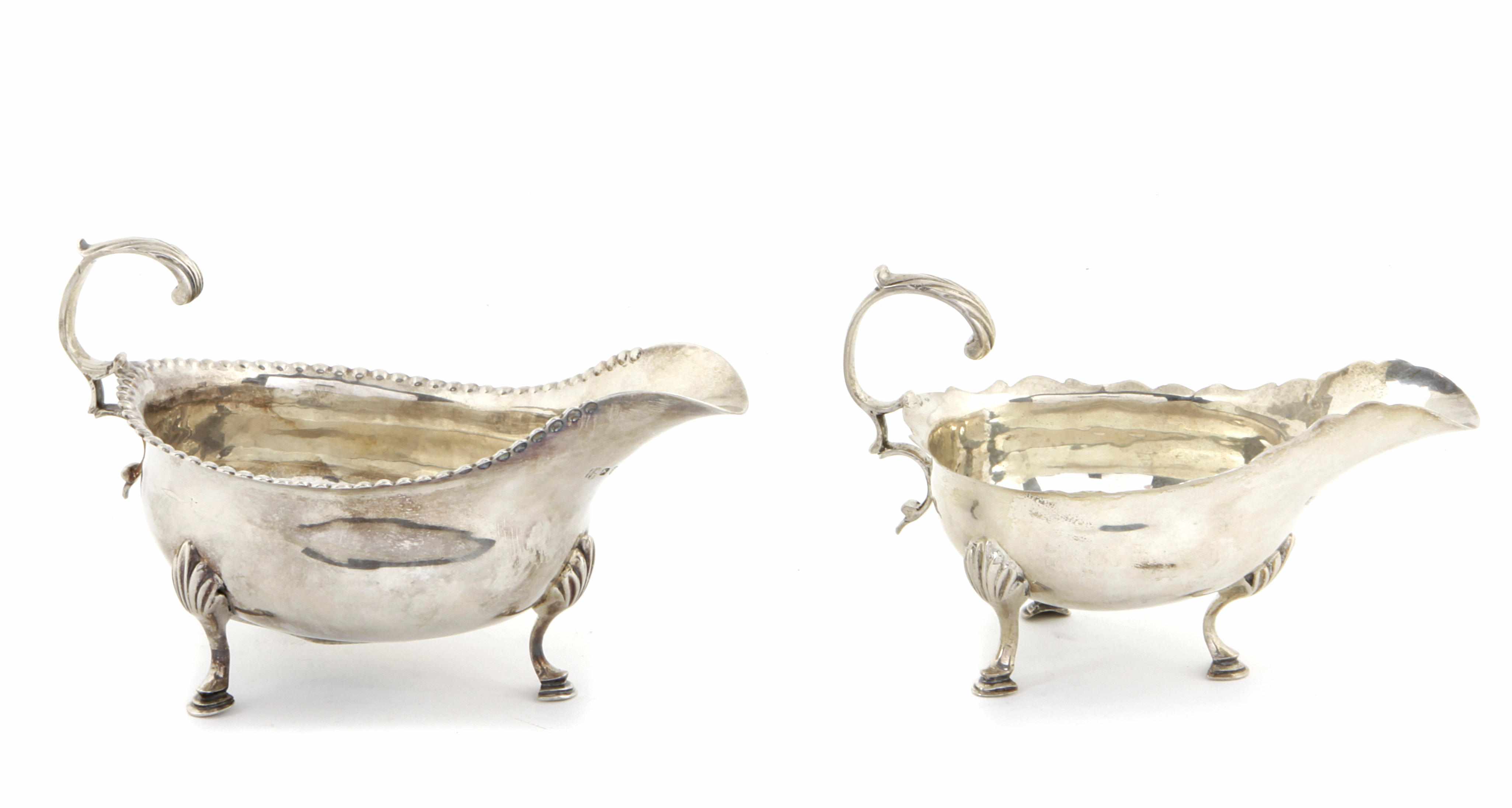 Appraisal: Two George III sterling silver sauce boats Peter and Ann