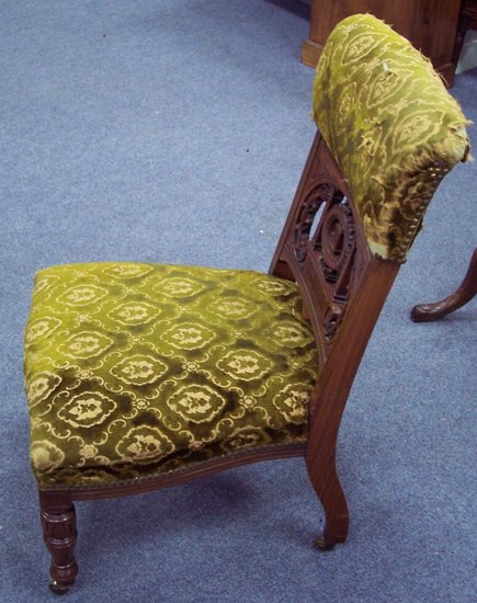 Appraisal: A late Victorian nursing chair with upholstered seat and padded