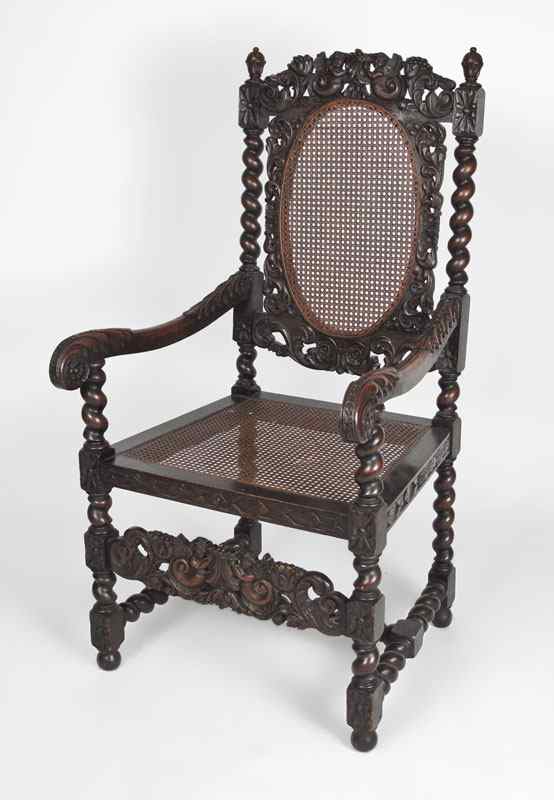 Appraisal: CHARLES II CARVED ARM CHAIR Carved and pierced frame having