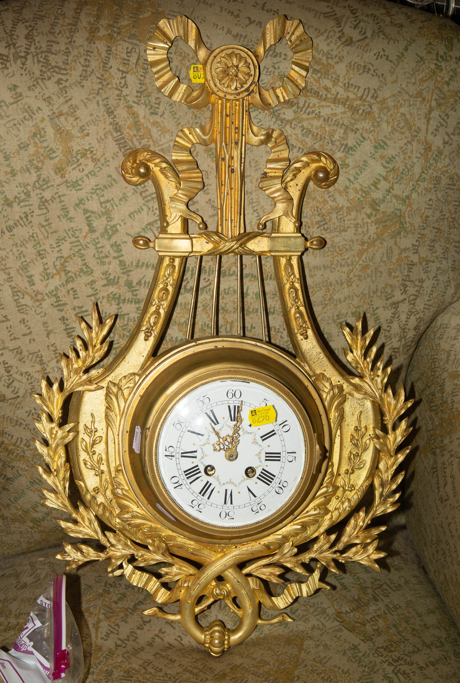 Appraisal: LOUIS XVI STYLE ORMOLU WALL CLOCK Continental th century With