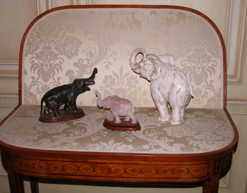 Appraisal: Title Decorative Elephants with Trunks up spelter-metal ceramic and carved