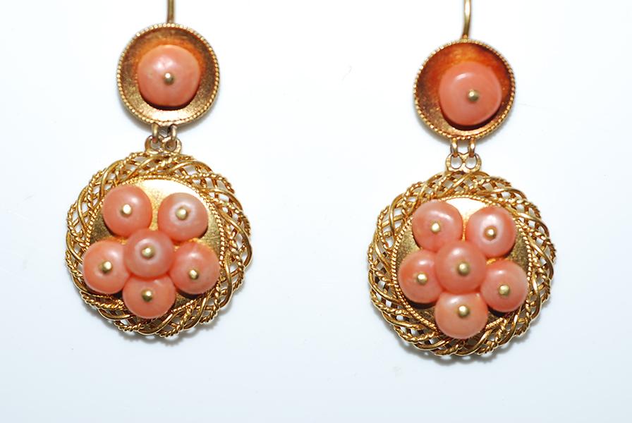 Appraisal: A PAIR OF CORAL DROP EARRINGS IN CT GOLD A