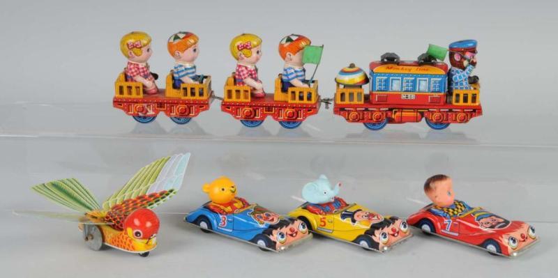 Appraisal: Lot of Tin Litho Friction Wind-Up Toys Description Japanese Working