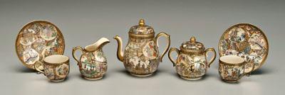 Appraisal: Satsuma coffee set shaped cartouches of various patterns interior and