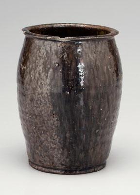 Appraisal: Stoneware jar slightly ovoid with flattened rim mottled runny dark