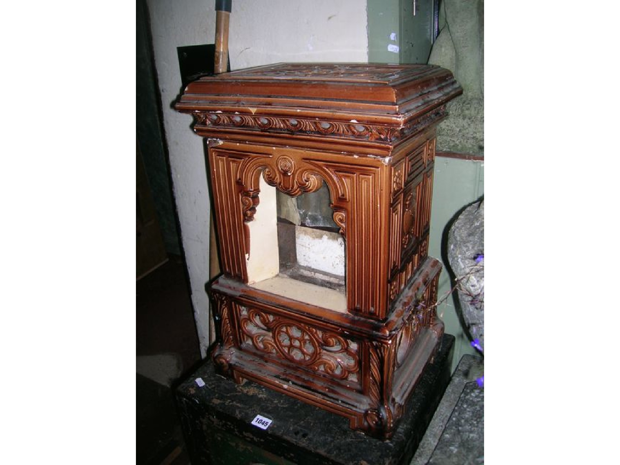 Appraisal: A small Victorian Doulton Lambeth treacle glazed heater with moulded