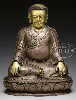 Appraisal: BRONZE STATUE OF A SEATED FIGURE th century China The