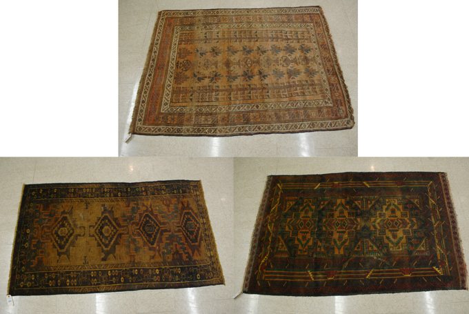 Appraisal: THREE BELOUCHI TRIBAL AREA RUGS all hand knotted in geometric