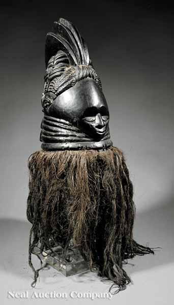 Appraisal: A Mende Mendi Carved Wood Helmut Mask Sowo-wui Sierra Leone