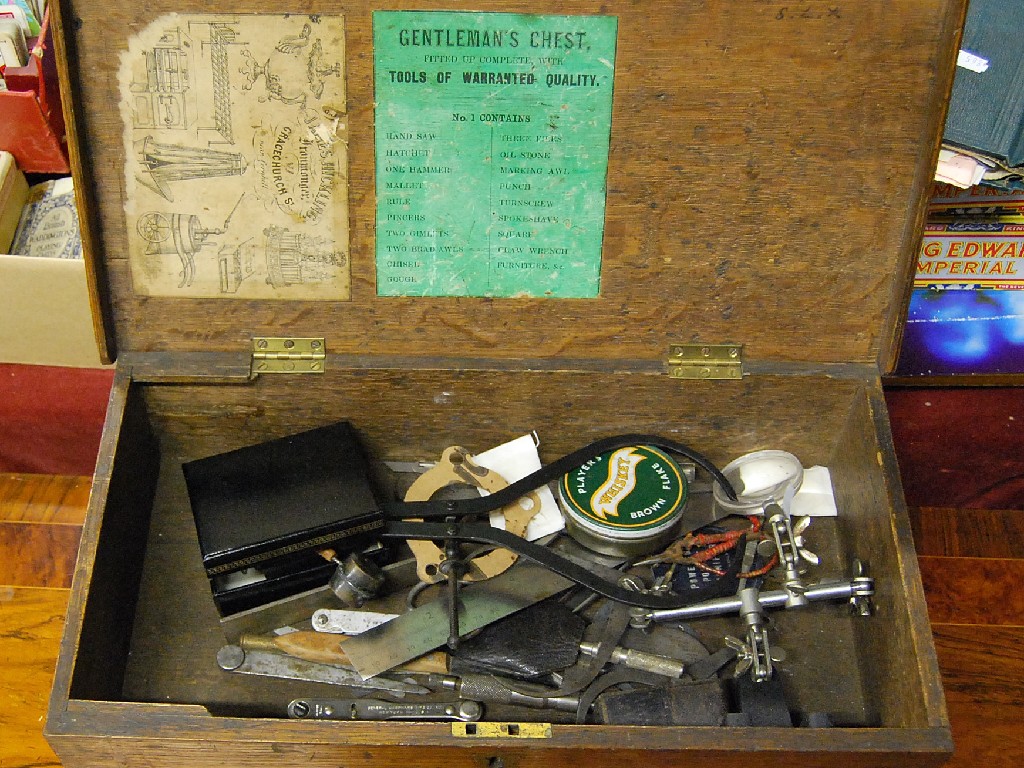 Appraisal: An Edwardian oak gentleman's tool chest and contents