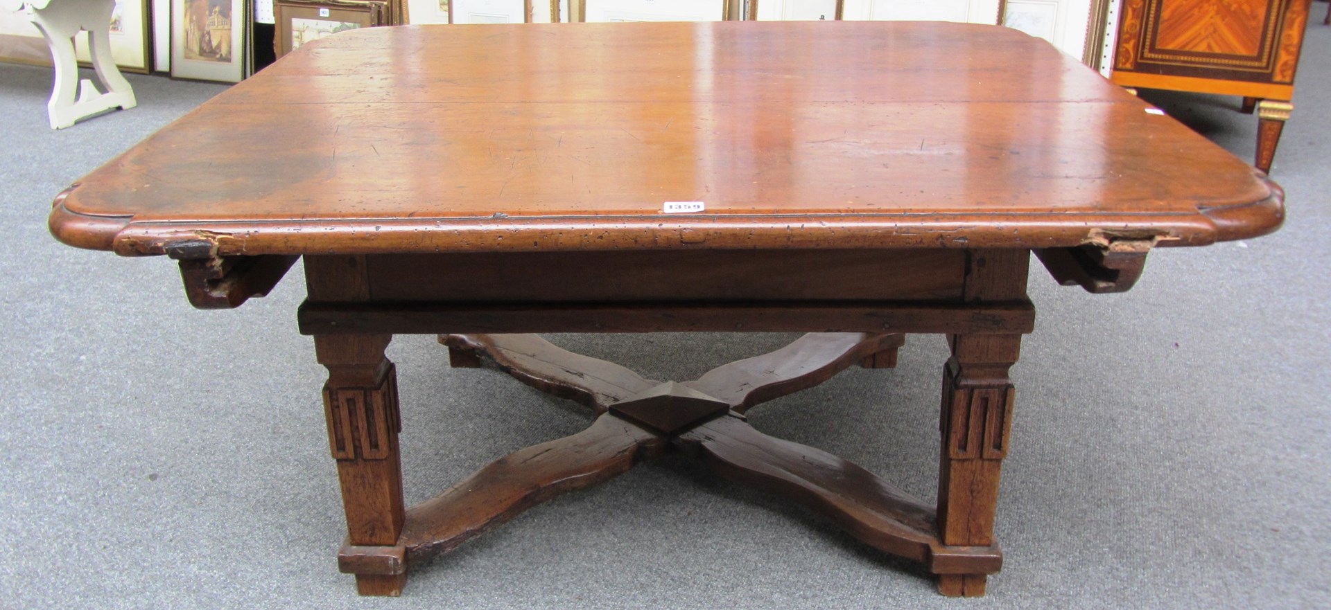 Appraisal: A made up th century Continental coffee table on tapering