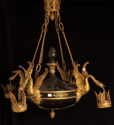 Appraisal: An Empire style gilt metal mounted electrolier with four swans