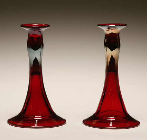 Appraisal: Pair of Diamond Glass red stretch glass candlesticks