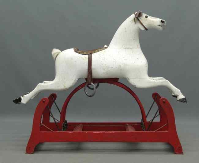 Appraisal: th c painted carved wooden rocking horse