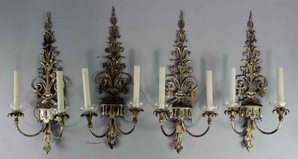 Appraisal: FOUR SILVERED METAL WALL LIGHTS late th early th century