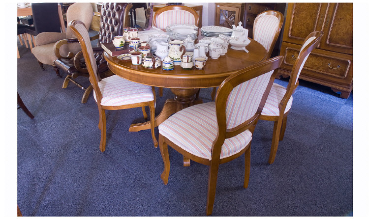 Appraisal: Modern Circular Extending Table Raised On A Turned Support Complete