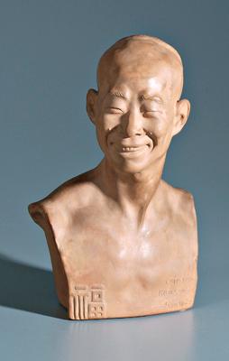 Appraisal: Terracotta bust after Jean Mich bust of smiling Chinese man