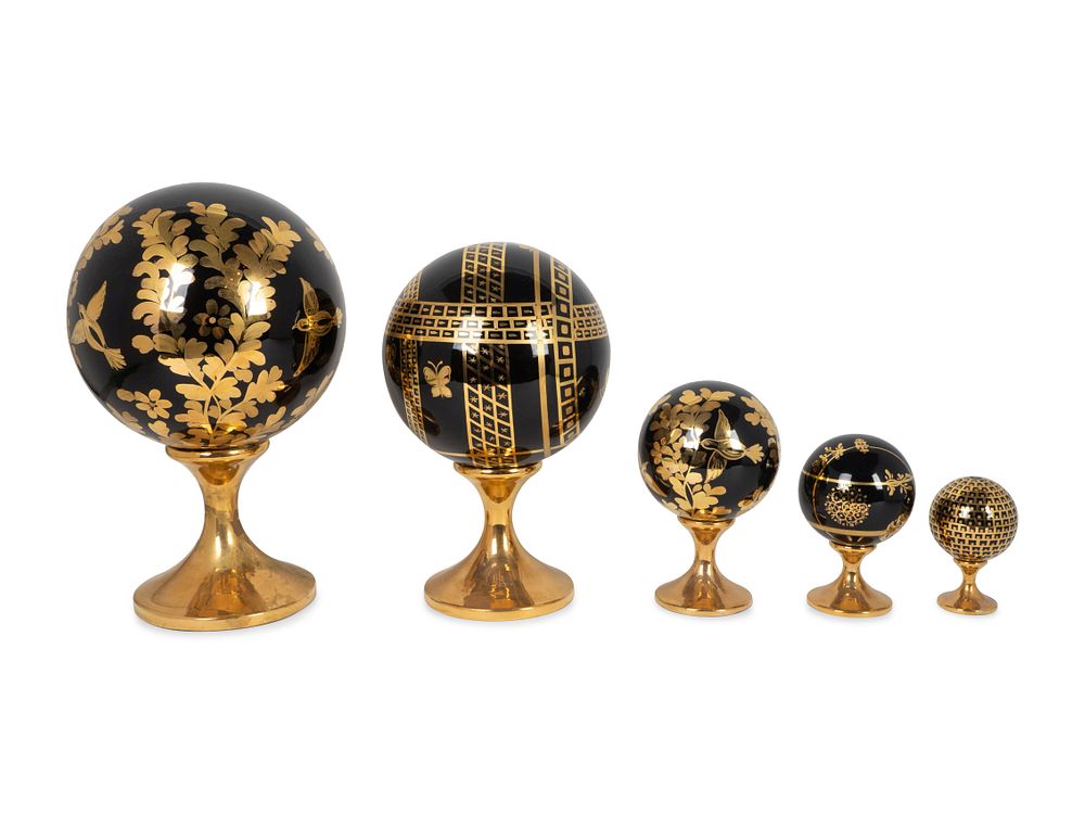 Appraisal: Five Italian Parcel-Gilt and Black-Glazed Porcelain Globes Heights to inches