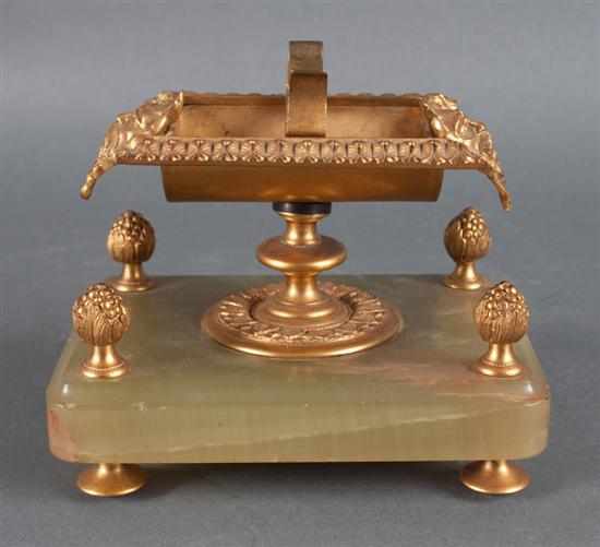 Appraisal: Continental gilt-metal and onyx smoking stand second half- th century