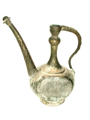 Appraisal: A Persian bronze ewer of flattened oval form and chased