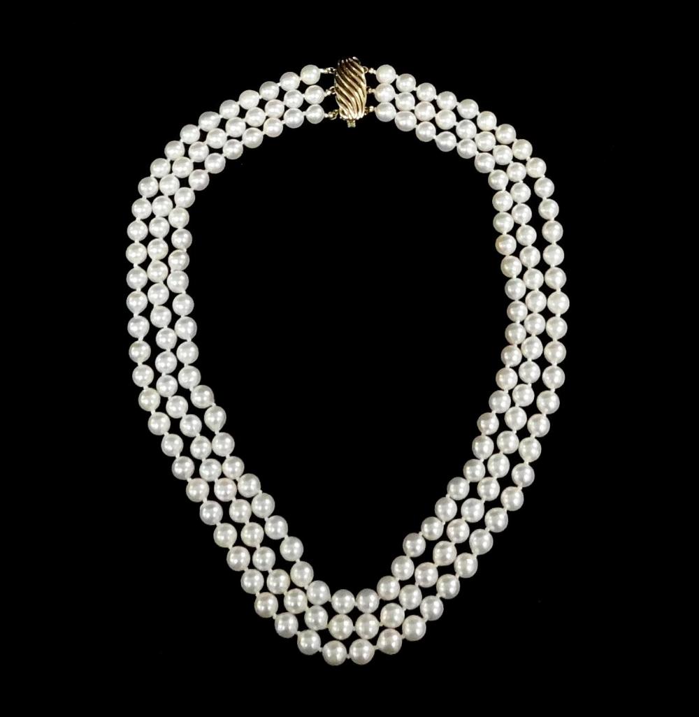 Appraisal: JEWELRY Triple strand cultured pearl necklace with K gold clasp