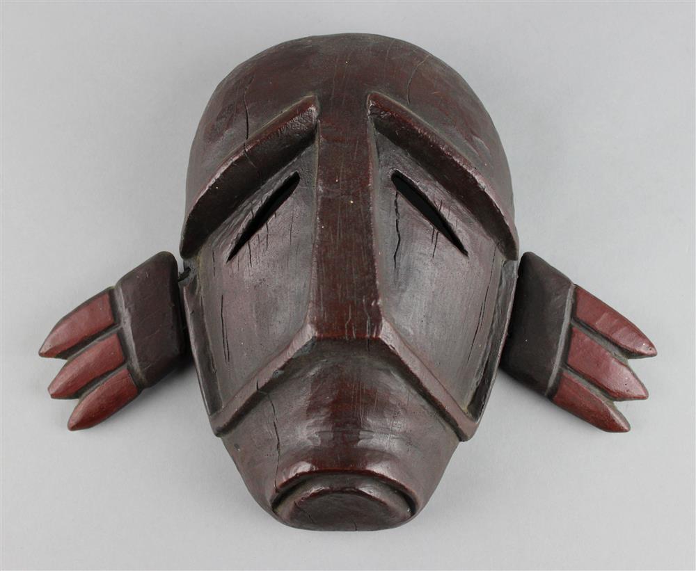 Appraisal: INUIT STYLE CARVED AND PAINTED FACE MASK WITH ARTICULATED WINGS