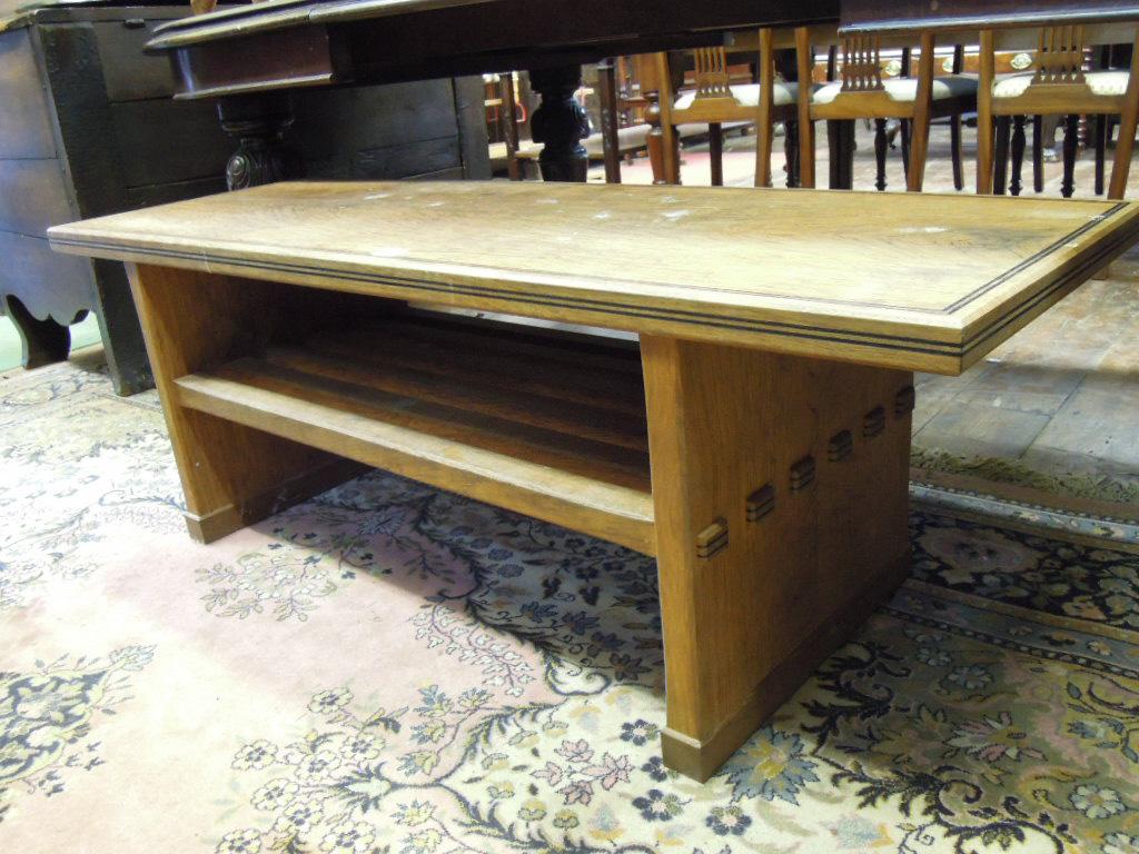 Appraisal: A contemporary craftsman made oak occasional table of rectangular form