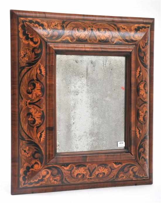 Appraisal: A Flemish walnut and marquetry wall mirror Circa The deep