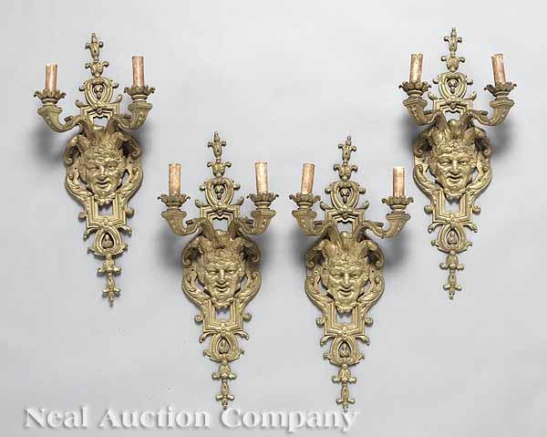 Appraisal: A Suite of Four Louis XIV-Style Bronze Sconces probably Paris