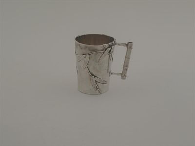 Appraisal: A late th century Japanese naturalistic mug with a simulated