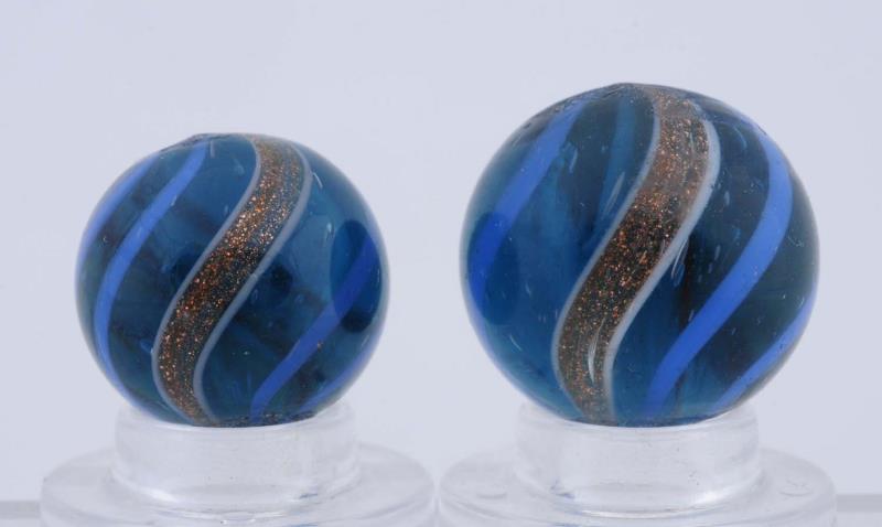 Appraisal: Lot Of Aqua Glass Banded Lutz Marbles Both are hard