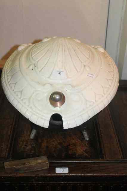 Appraisal: A CONTINENTAL CAST IRON COAL BOX of oval shaped form