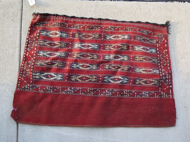 Appraisal: Turkish Handmade Camel Bag designs on deep red field '