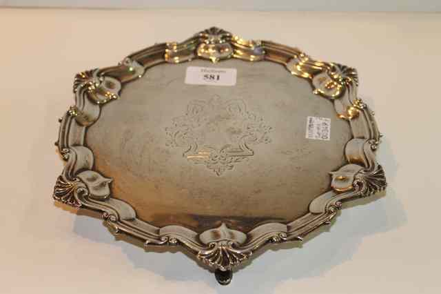 Appraisal: A SILVER SALVER of hexagonal form with raised border and