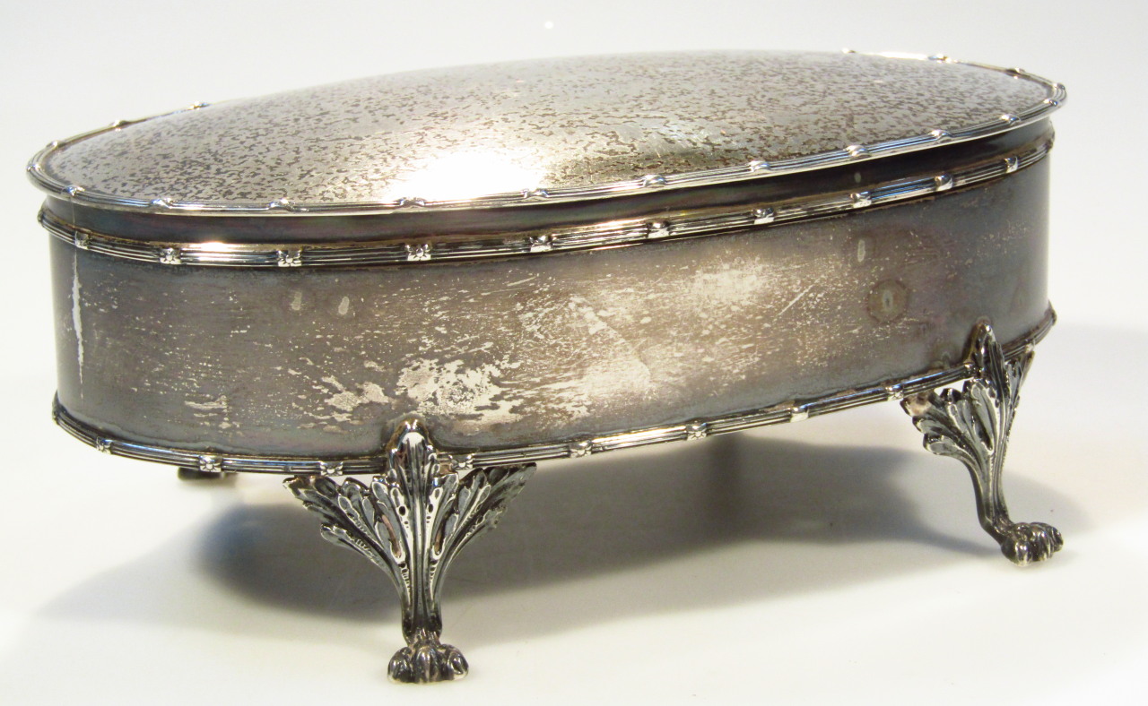 Appraisal: An Edwardian silver jewellery casket with Goldsmiths and Silversmiths mark