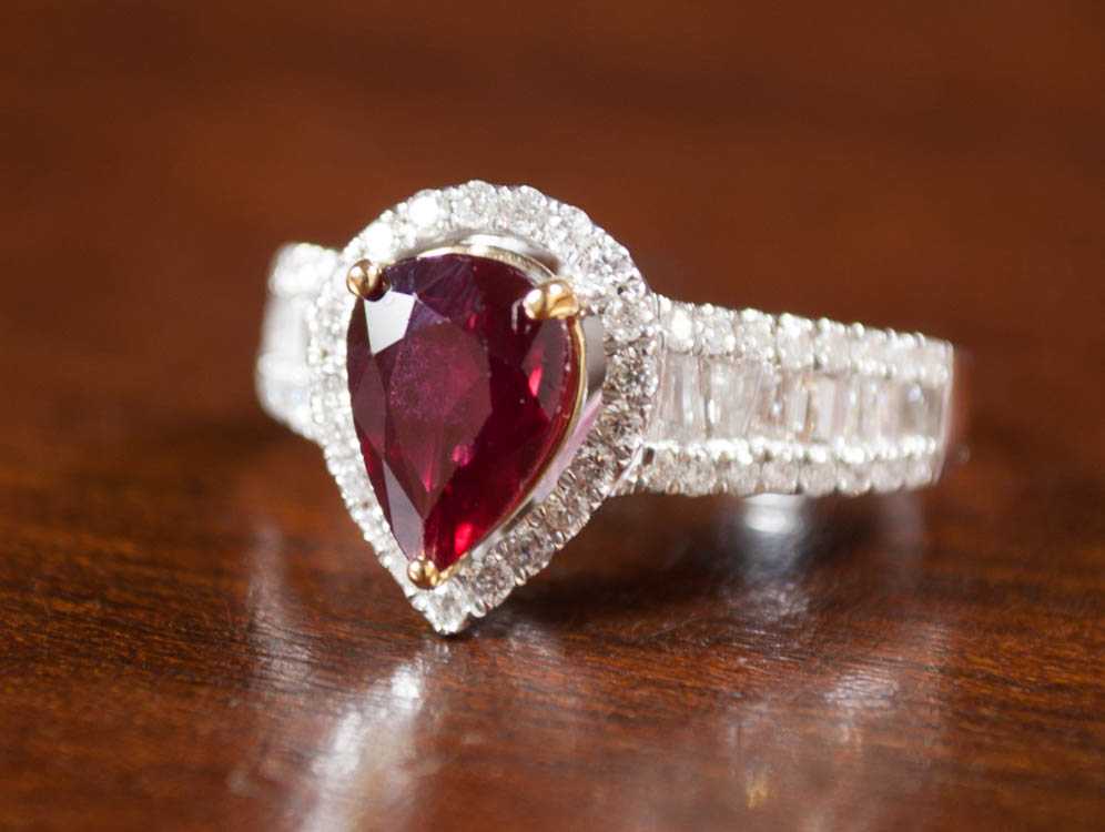 Appraisal: RUBY DIAMOND AND FOURTEEN KARAT GOLD RING with AIGS Gemstone