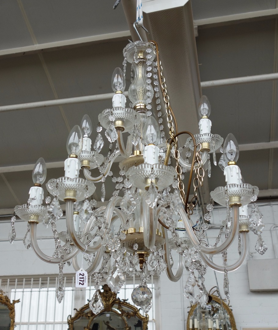 Appraisal: A modern glass twelve branch chandelier the moulded baluster stem