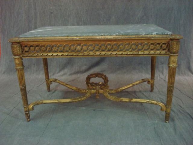 Appraisal: Louis XVI marbletop giltwood center table w wreath form center